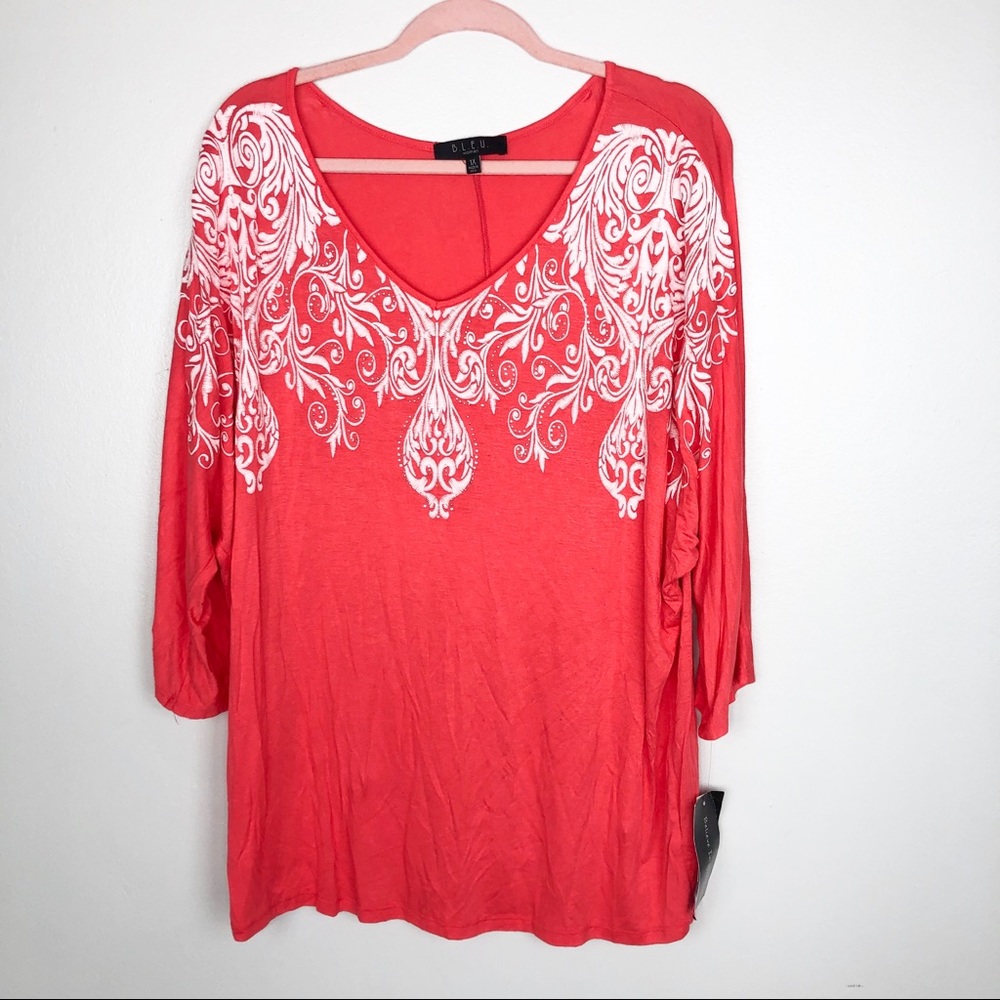 Coral and white blouse